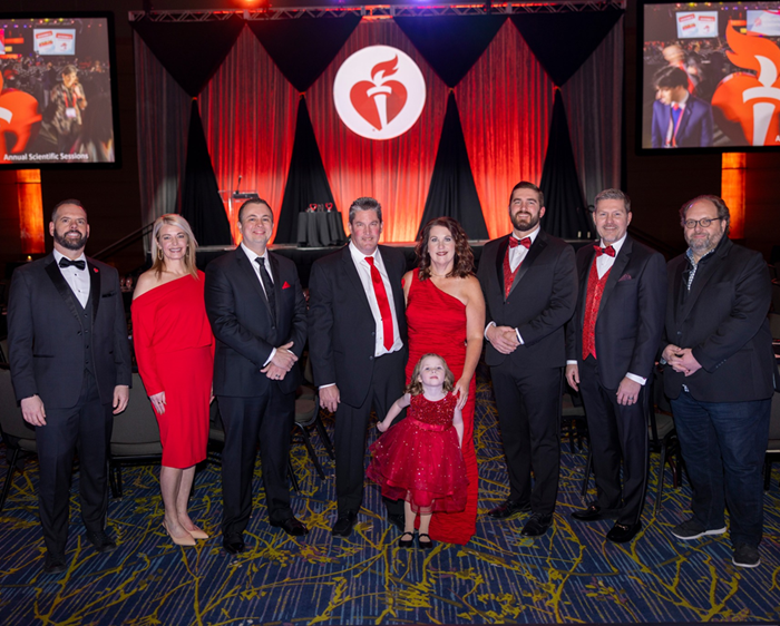 Group of people in formal dress.